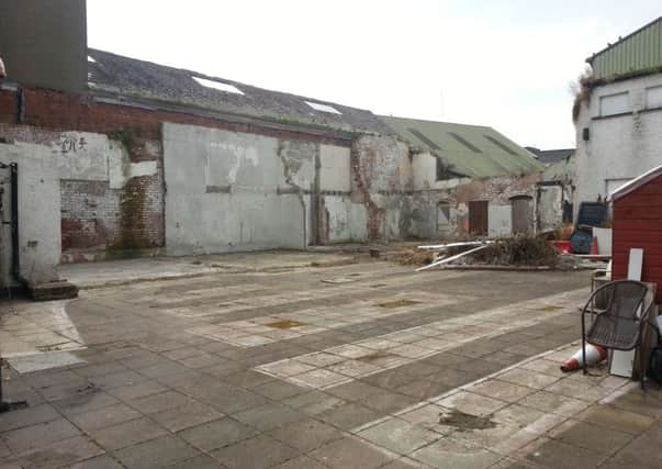 The disused site off Haslem's Lane that is to be transformed by the creation of the Penny Square Market.