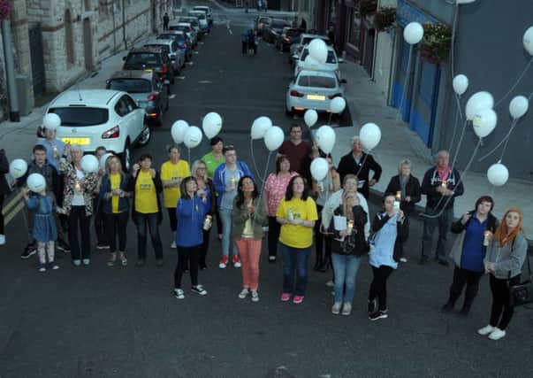 Balloons are released by members and friends of Larne branch of PIPS,to mark World Suicide Prevention Day. INLT 38-200-AM