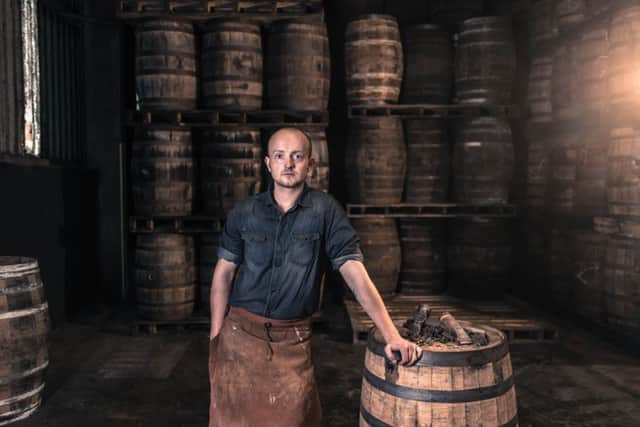 Chris Kane is the fourth generation of his family to cooper casks at the distillery. INBM 39-702-CON