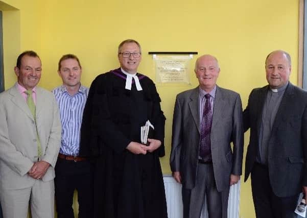 At the unveiling of a commemorative plaque to mark the official opening of Drumbo Presbyterians new church halls are (LtoR) Drumbo Elder Denis Currie, architect Jonathan Todd, Presbyterian Moderator Rt. Rev. Dr. Frank Sellar, Mark Crowe of contractors ME Crowe Ltd and the Minister of Drumbo Presbyterian Church, Rev. Adrian McLernon.