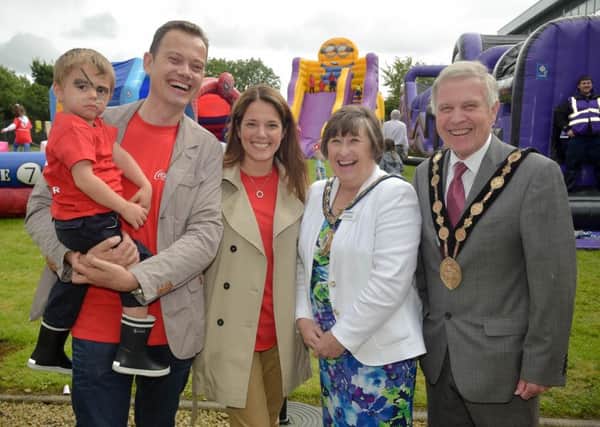 The Mayor and Mayoress joined employees at the Coca-Cola HBC plant at Knockmore Hill for a big day of family fun.