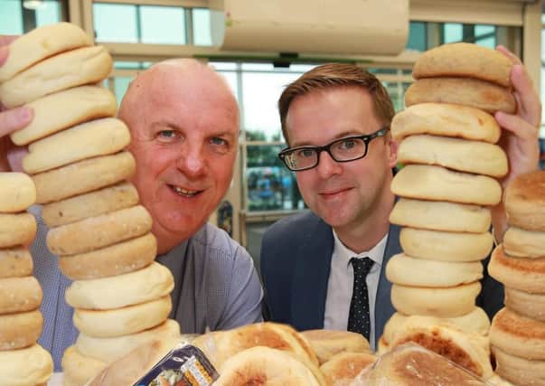 Asda regional buying manager Brian Conway, left, with Chris Moore, national account manager for Irwins Bakery. INPT38-005
