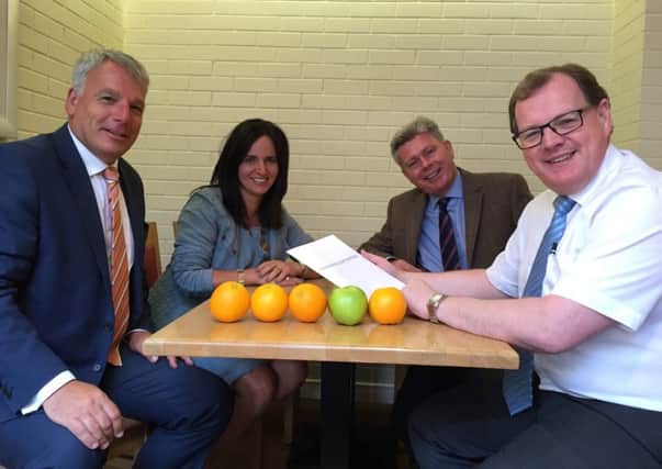 Businessman Thomas McKillen with Charles Eves and Gary Sims (Renewable Partnerships) and Alison Moore, BID.