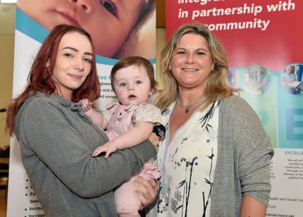 Pictured at the Northern Trust launch event for the Family Nurse Partnership are Gabrielle Moore from Coleraine with baby Nina and Tanya Flanagan, Family Nurse.