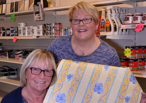 End Of The Roll...Susan McClune, left, and sister, Ruth Castles, owners of Andrews Wallpapers have decided to retire after over 40 years working in the shop which their father and his brother founded 65 years ago. Sadly the shop will close on Friday. INLM39-200.