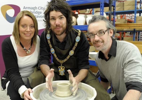 Lord Mayor Cllr Garath Keating at Scarva Pottery Supplies, Banbridge pictured with Arts & Events Officer Leah Duncan and Brendan Fitzpatrick from Scarva Pottery Supplies Â©Edward Byrne Photography