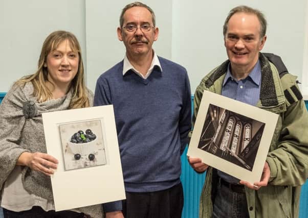 Ian Lyons (centre) with Colour Print winner Natalie Sloan and Joe McKay who won the Black & White section.