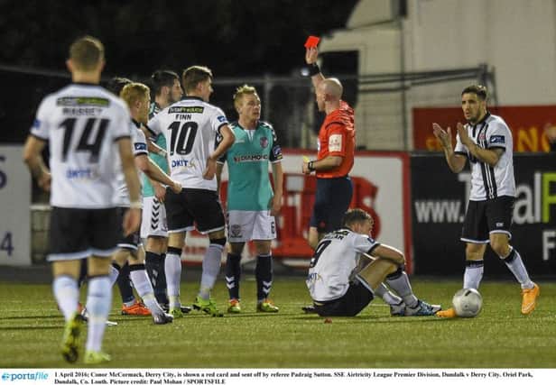 Conor McCormack, Derry City, is shown a red card and sent off by referee Padraig Sutton. during Derry's last visit to Oriel Park back in April.