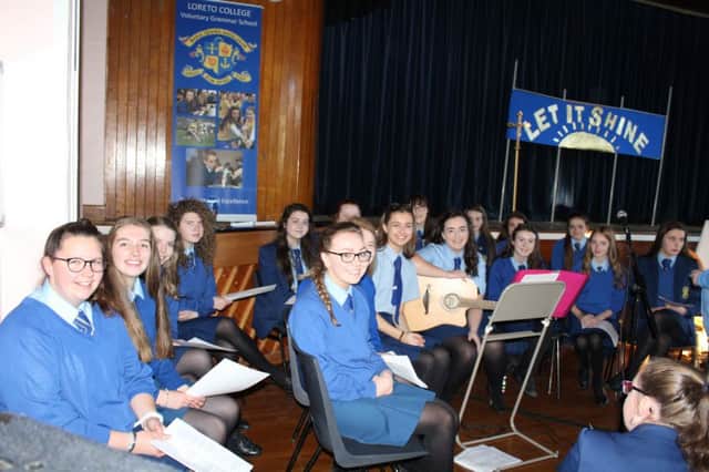 Members of the folk group who sang during the Loreto College Opening Mass.