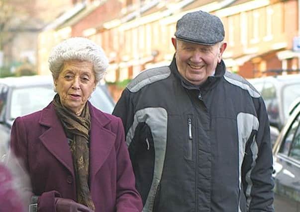 An elderly couple are glad they congtacted a benefits adviser