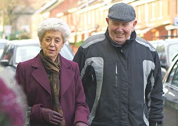 An elderly couple are glad they congtacted a benefits adviser