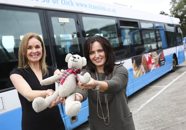 Celebrating with Alison Moore, BID Manager, and the Â‘Ballymena BearÂ’ is Jayne Hunter from Exterion Media. (Submitted Picture).