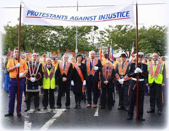 Councillor Darryl Wilson and members pictured at last night's parade in Ballymoney.