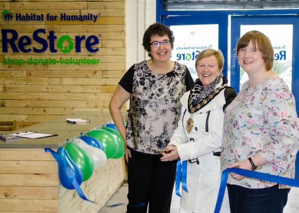 Habitat ReStore Opening: The Mayor of Mid and East Antrim, Cllr Audrey Wales MBE, cuts the ribbon to officially open Habitat ReStore at Bridge Park, Larne Road, with (L) Jenny Williams, Habitat NI Chief Executive and (R) Isobel Kerr, Habitat ReStore Manager.