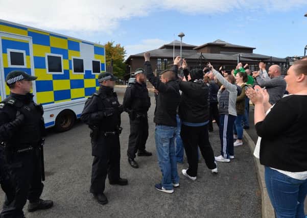 Supporters outside Craigavon Court  as Four men have appear  following the discovery of an armour-piercing mortar in Lurgan, County Armagh.  Shea Reynolds, 22, Ciaran Magee, 24, and Damien Duffy, 46, are charged with targeting a former member of the security forces. While Luke O'Neill, 22, was charged with attempting to murder police officers and having an improvised explosive device. 
Pic Pacemaker Press 27/9/2016