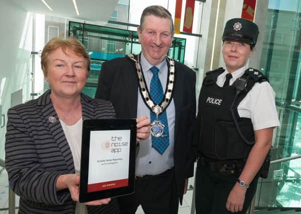 Targeting Nuisance Noise for Appy Citizens: Mid & East Antrim Borough Council has launched its first free mobile app targeting nuisance noise, The Noise App, in partnership with the Police Service of Northern Ireland and the Northern Ireland Housing Executive. Pictured at the launch event at The Braid, Ballymena, is Deputy Mayor, Alderman William McNeilly, Inspector Heather Scott from the PSNI, Mairead Myles Davy from the NI Housing Executive.