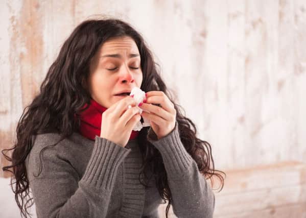 A woman with the common cold