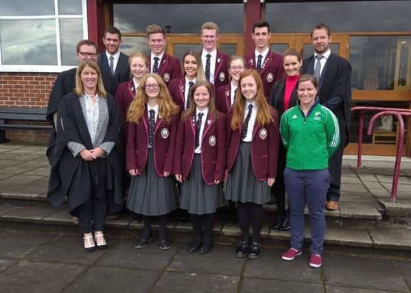 High-achieving pupils pictured alongside guest speaker, Shirley McKay, at the Carrick Grammar extra-curricular awards assembly. INCT 40-802CON