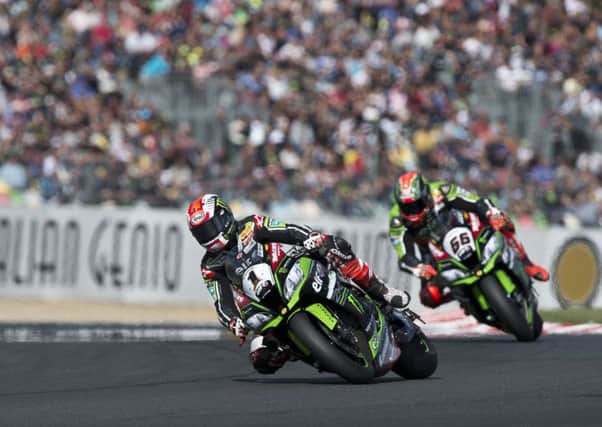 Jonathan Rea leads his Kawasaki team-mate Tom Sykes at Magny-Cours in France.