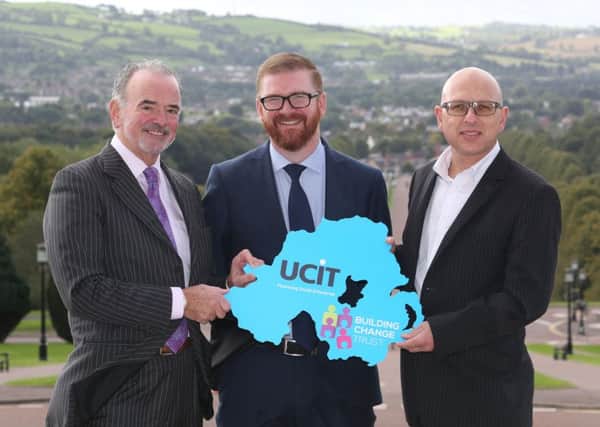Pictured with the Economy Minister, Simon Hamilton (centre), are Harry McDaid, CEO of UCIT and Nigel McKinney, BCTs Director of Operations 
Pic by Andrew Paton, Press Eye.com