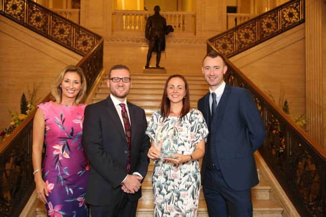 Charlene Dickey,  Northern Ireland's top mum, pictured with husband Neil, awards host Claire McCollum and Desi Derby, SuperValu head of marketing. Pic: Darren Kidd / Press Eye. INCR 40-797-CON