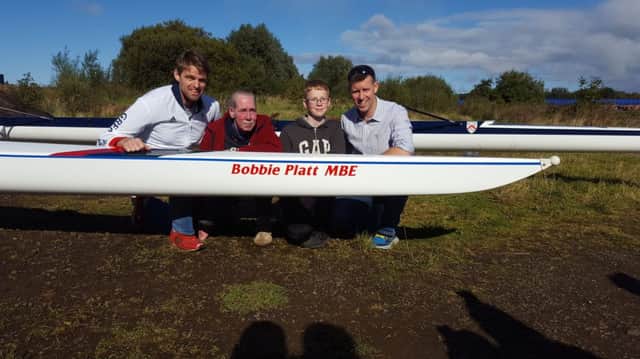 Alan Campbell and Richard Archilbald pictured with Bobbie's Son and Grandson as they unveil the new boat.