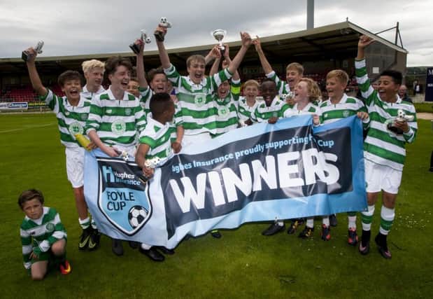 Celtic starlet, Karamoko Dembele pictured celebrating with the U14 team which won the Insurance Foyle Cup at Brandywellin the summer. FC06-M1-06