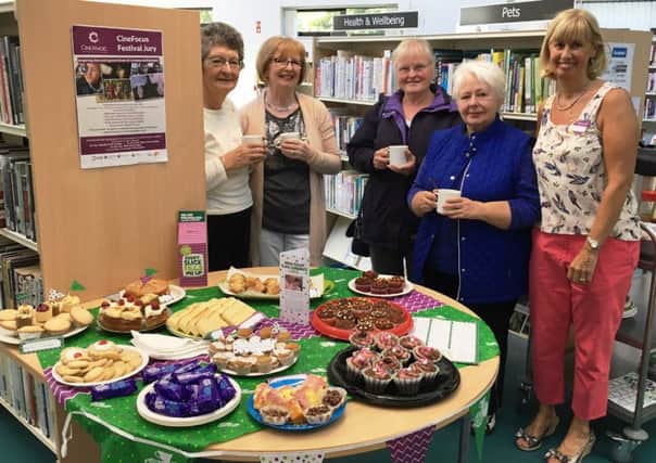 Enjoying the World's Biggest Coffee Morning fundraiser at Finaghy Library.