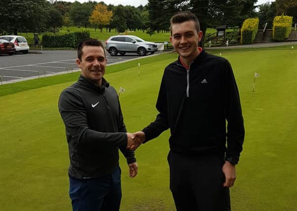 Banbridge Golf Club's Matchplay Champion Christopher Lennon is congratulated by beaten finalist Roy Sipson.