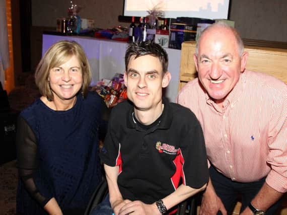 Paul McLister who organised the event with his parents Brian and Mary McLister pictured at the Ulster Barbarians Wheelchair Rugby Club night at the Races held at the Marine Hotel in Ballycastle on Saturday evening