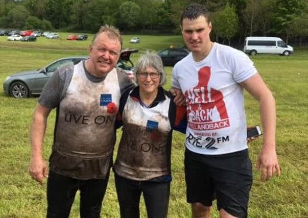 George McNally, Roberta McNally and Jamie McNally completed the gruelling Hell and Back challenge as part of their fundraising effort.