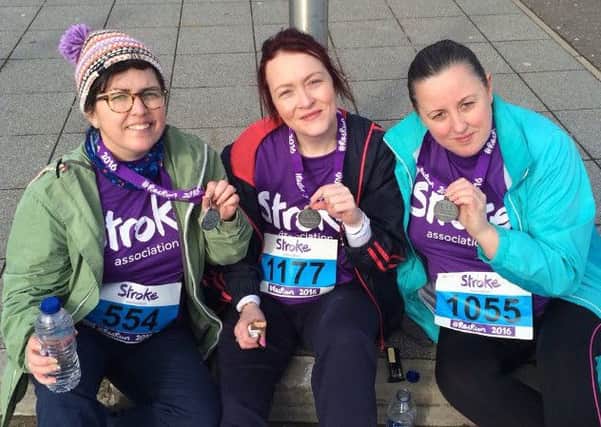 Kate Gorman (centre) with friends Anna Corr McCracken and Jacky Rea after completing one of the fundraising events earlier this year.  INCT 43-731-CON