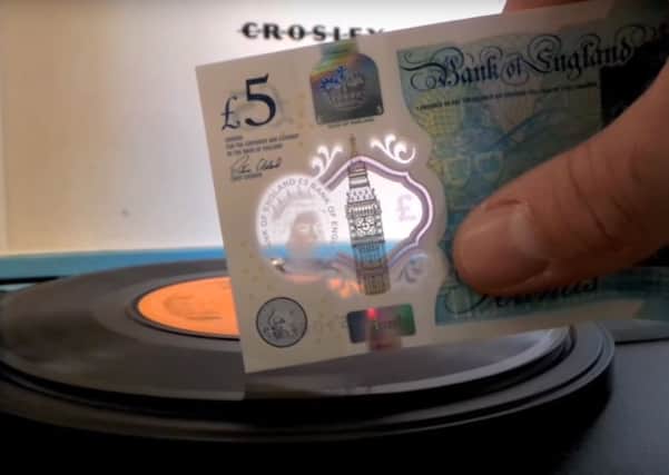The new Â£5 note can play vinyl records.
