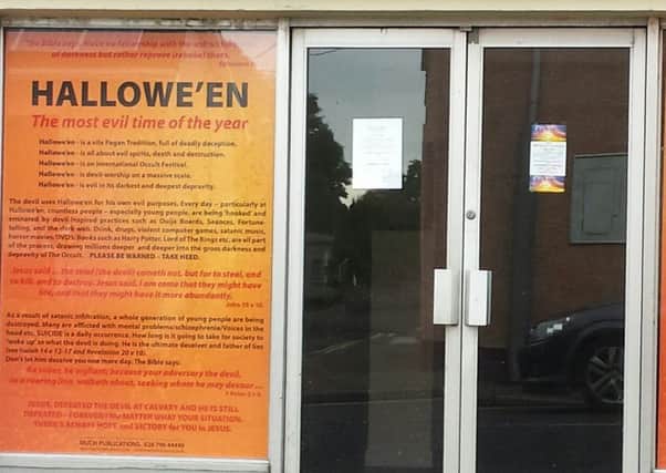 Halloween poster in the window of the Christian Drop-in Centre, Maghera