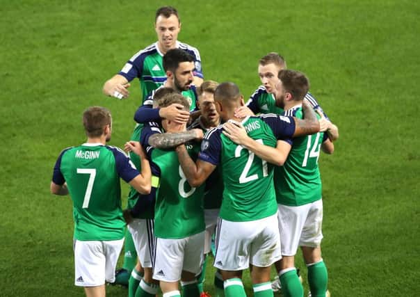Northern Ireland players will wear black armbands to mark Armistice Day