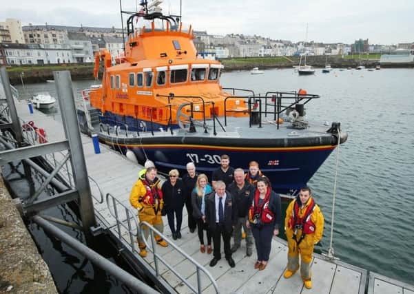 Claire Sugden visited the RNLI  Portrush where she met Robert Cardwell, Lifeboat Operations Manager and local volunteers. Picture by Kelvin Boyes / Press Eye