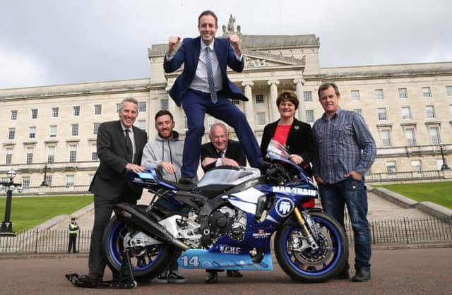 Sports Minister Paul Givan with road racers Lee Johnston and John McGuinness, NW200 event Director Mervyn Whyte, First Minister Arlene Foster and Ian Paisley MP at Stormont where he announced Â£124,000 of funding for the Vauxhall International North West 200 road races.
 PICTURE BY STEPHEN DAVISON. INCR 44-707-CON