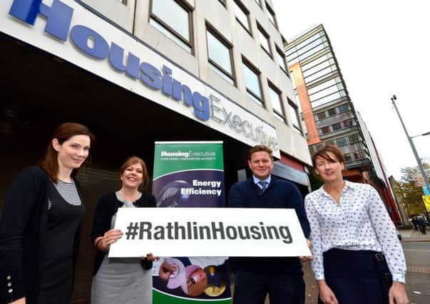 Housing Executive staff promoting Rathlin housing