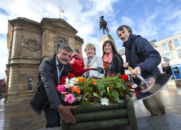 General Parks Manager Paul Jess, The Mayor of Causeway Coast and Glens Borough Council, Alderman Maura Hickey, Economic Development Officer for Town ManagementÂ  Julienne Elliott, and Parks Supervisor James McClements pictured in Coleraine Town Centre after Coleraine won the Large Town title at this years Britain in Bloom competition.PICTURE STEVEN MCAULEY/CCGBC