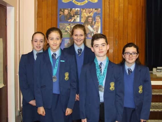 Swimmers who represented Loreto College at the Swim Ulster Schools Championships: Niamh McGarry, EilÃ­s Mullan, Eoin Mullan, Shannon Baird and Orla Quinn.