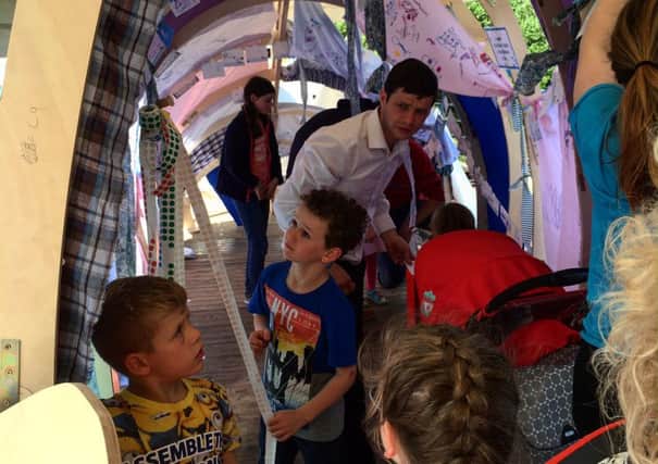 Children take part in activities inside the Dopey Dick replica during his last local visit during the Foyle Maritime Festival.