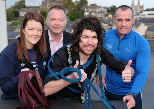 Getting ready for the Southern Area Hospice Christmas Abseil at the Armagh City Hotel on the Fourth of December . From left: Anne MacOscar, Southern Area Hospice; Barry Donaghy, General Manager, Armagh City Hotel; Garath Keating, Lord Mayor, Armagh City, Banbridge & Craigavon Borough Council and Tommy Stevenson, Andy Ward Health and Fitness Studio. Photograph: Columba O'Hare Stevenson, Andy Ward Health and Fitness Studio. Photograph: Columba O'Hare