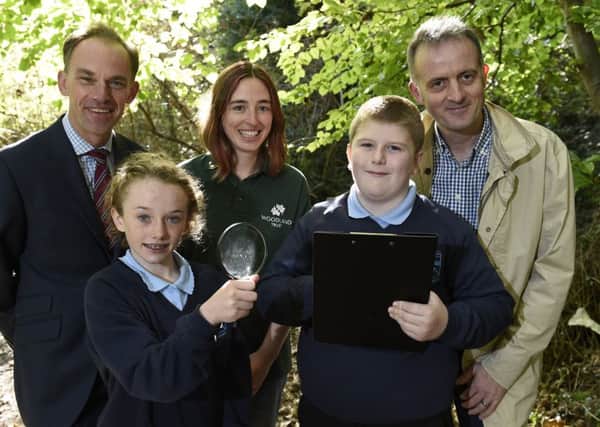 Toni Wilkinson and Andrew Christie from Hazelwood Integrated Primary School pictured with  Warren Bell, Alpha Resource Management; Rosie Irwin, the Woodland Trust; and Richard Rogers, Groundwork Northern Ireland. Picture by Michael Cooper. INNT 43-836CON