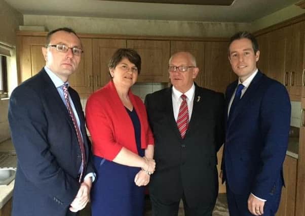 Ministers Arlene Foster and Paul Givan with MLA Keith Buchanan and a representative of Salterstown OH