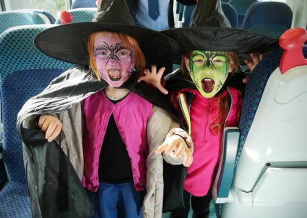 Pictured ready for Halloween are young passengers Lara Martin (9) and Tess Martin (7). Translink is offering a special Halloween Family Train on Saturday 29th October for the Out Of This World festival in Londonderry. For more details, visit translink.co.uk/halloween2016/.
