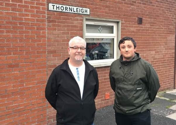 Sinn Fein Cllr Liam Mackle with Tiarnan Haddock who were calling on Department of Infrastructure to tackle issues on LED lighting