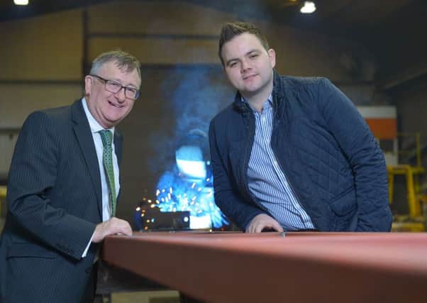 Family engineering business Warwick Engineering is investing in machinery and ten additional staff with support from Invest Northern Ireland. Pictured (left) is Damian McAuley, Invest NI, with David Warwick, Warwick Engineering. Submitted.