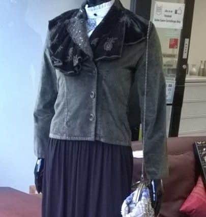 Victorian garb will be on display at Carrick's Action Cancer store. INCT 43-726-CON