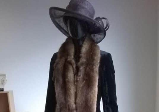 Victorian garb will be on display at Carrick's Action Cancer store. INCT 43-727-CON