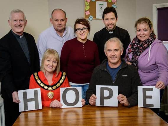Thoes behind the Walk of Hope are, from left, deputy chair of Mid Ulster District Council, Councillor Sharon McAleer, and Dr Leonard McCammon and back, from left, Rev G Tremer, Sean McElhatton, Mid Ulster District Council, Helen Kirkpatrick, The Beacon Centre, Rev A Rawding and Donna Arrell, The Beacon Centre
